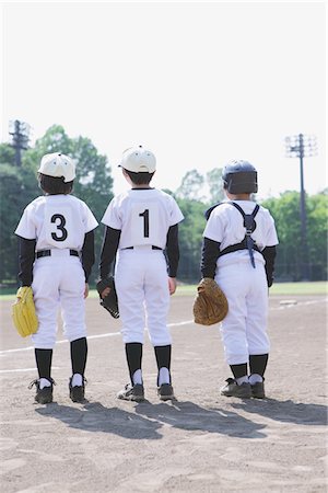 playing baseball - Baseball Player Standing In Baseball Field Stock Photo - Rights-Managed, Code: 859-03755423