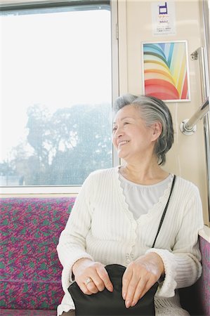 simsearch:859-03860700,k - Senior woman traveling on a train Foto de stock - Con derechos protegidos, Código: 859-03755498