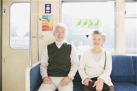 senior adult relaxing portrait not child - Two senior adults traveling on a train Stock Photo - Rights-Managed, Code: 859-03755515