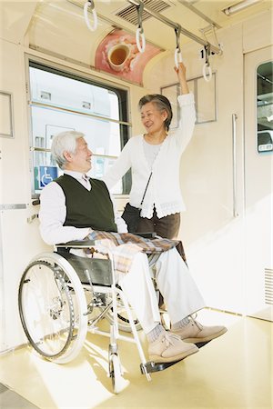 simsearch:859-03860700,k - Senior Adult Man On Wheelchair With His Wife Foto de stock - Con derechos protegidos, Código: 859-03755534