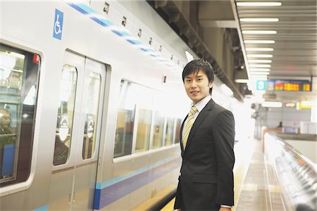 development suit business - Young-Adult Man At Railway Station Stock Photo - Rights-Managed, Code: 859-03755550