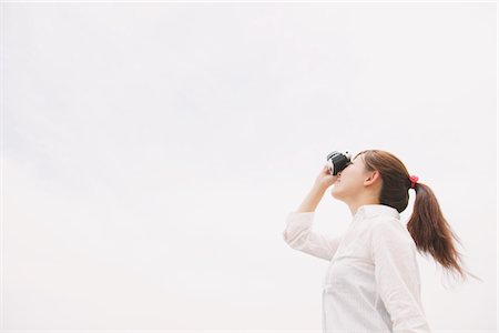 Young Woman Taking Picture Stock Photo - Rights-Managed, Code: 859-03779882