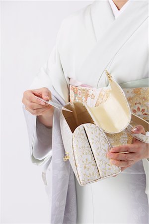 simsearch:859-03779954,k - Mid-Section Japanese Woman Holding Purse Stock Photo - Rights-Managed, Code: 859-03779947