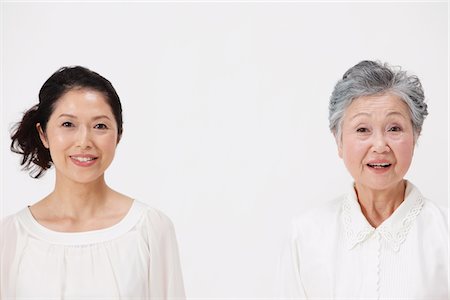 elderly woman posing - Mother And Adult Daughter Smiling Stock Photo - Rights-Managed, Code: 859-03779990