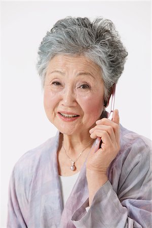 phone one person adult smile elderly - Senior Woman Using Cellular Phone Stock Photo - Rights-Managed, Code: 859-03780013