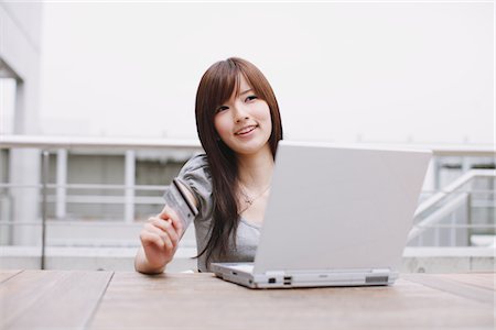 Young Girl Using Laptop Stock Photo - Rights-Managed, Code: 859-03780067