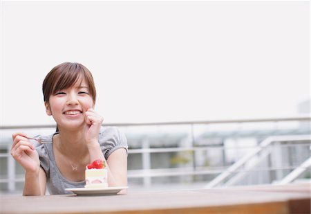 Teenage Girl With A Plate Of Strawberry Cake Stock Photo - Rights-Managed, Code: 859-03780116