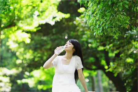 Young Woman Drinking Water from Bottle Stock Photo - Rights-Managed, Code: 859-03782195
