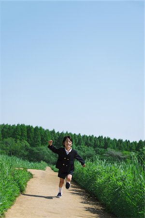 school children in uniform - Boy Wearing Uniform Running in Park Stock Photo - Rights-Managed, Code: 859-03782277