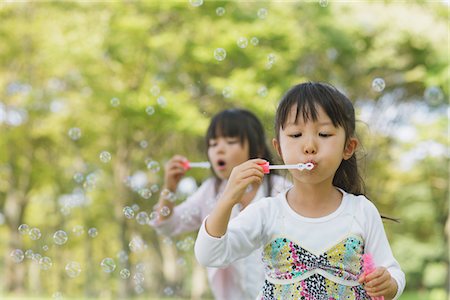 simsearch:632-05604245,k - Girls Blowing Bubbles Stock Photo - Rights-Managed, Code: 859-03805782