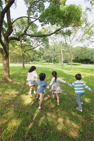 simsearch:614-07194495,k - Children Walking In Park Together Stock Photo - Rights-Managed, Code: 859-03805844
