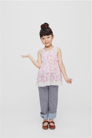 preteen asia - Happy Girl Hands Showing Stock Photo - Rights-Managed, Code: 859-03806027