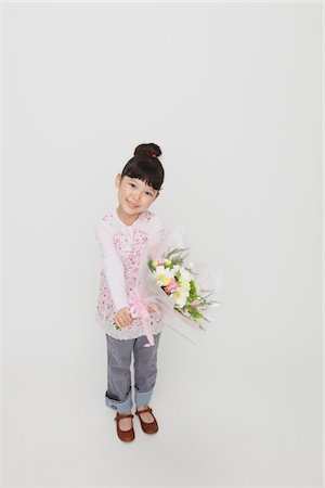 simsearch:6107-06117573,k - Girl Holding Bouquet Stock Photo - Rights-Managed, Code: 859-03806059