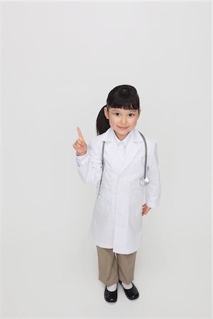 simsearch:693-06380036,k - Girl Dressed Up As Doctor Pointing Foto de stock - Con derechos protegidos, Código: 859-03806123