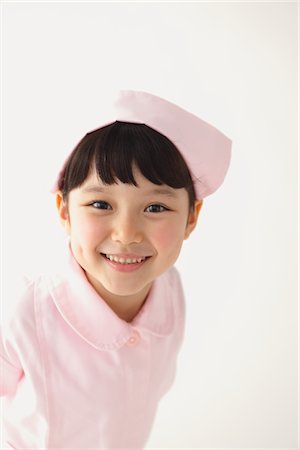 simsearch:693-06380036,k - Happy Girl Dressed As Nurse Foto de stock - Con derechos protegidos, Código: 859-03806183