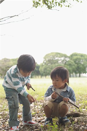 Children in Park Collecting Twig Stock Photo - Rights-Managed, Code: 859-03806226