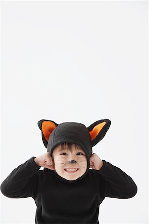 playful cats - Boy Dressed As Cat Costume Stock Photo - Rights-Managed, Code: 859-03806321
