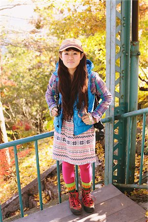 explorer - Smiling Japanese Young Woman Foto de stock - Con derechos protegidos, Código: 859-03839446