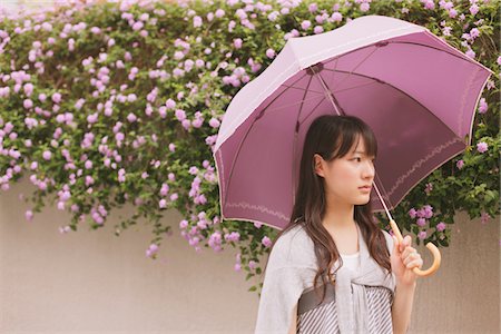simsearch:859-03983201,k - Young adult woman with umbrella Stock Photo - Rights-Managed, Code: 859-03840091