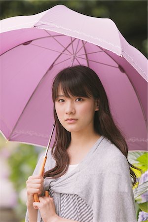 simsearch:859-03983201,k - Young adult woman with umbrella Stock Photo - Rights-Managed, Code: 859-03840146