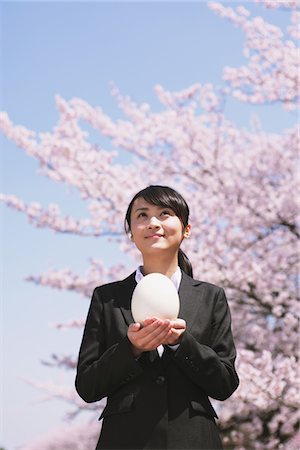 simsearch:859-06380299,k - Businesswoman Holding an Egg Stock Photo - Rights-Managed, Code: 859-03840234