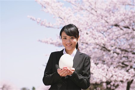 simsearch:859-06380299,k - Businesswoman Holding an Egg Stock Photo - Rights-Managed, Code: 859-03840232
