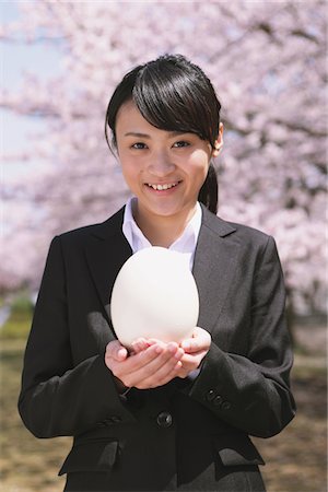 simsearch:859-06380299,k - Businesswoman Holding an Egg Stock Photo - Rights-Managed, Code: 859-03840233