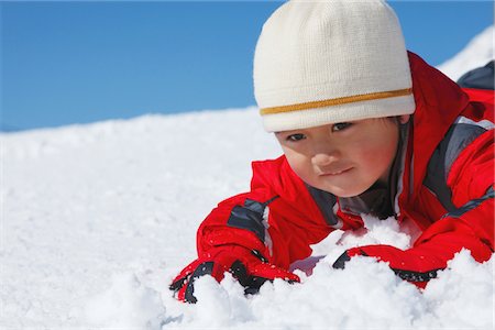 sliding - Boy Sliding Downward On His Belly Stock Photo - Rights-Managed, Code: 859-03840590