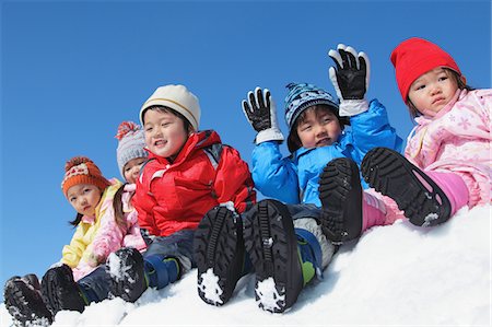 simsearch:859-03840695,k - Children Sitting Together In Snow Stock Photo - Rights-Managed, Code: 859-03840603