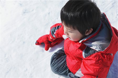 simsearch:614-07194495,k - Boy Wearing Snowsuit and Sitting In Snow Stock Photo - Rights-Managed, Code: 859-03840613