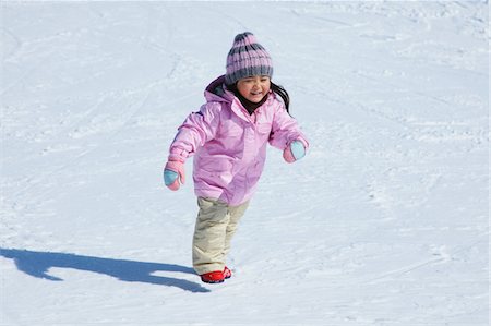 simsearch:614-07194495,k - Happy Small Girl Running In The Snow Stock Photo - Rights-Managed, Code: 859-03840655