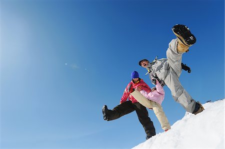 simsearch:859-03840695,k - Family Having Fun In The Snow, Jumping Stock Photo - Rights-Managed, Code: 859-03840928