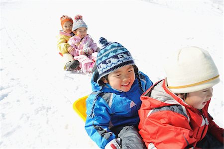 simsearch:859-03840695,k - Children Sledging In Snow Stock Photo - Rights-Managed, Code: 859-03840939