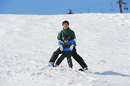 simsearch:859-03840695,k - Father Skiing With His Son Stock Photo - Rights-Managed, Code: 859-03840957