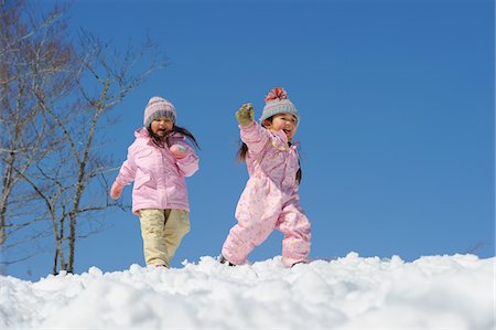 simsearch:625-02929316,k - Sisters Playing In Snow Stock Photo - Rights-Managed, Code: 859-03840984