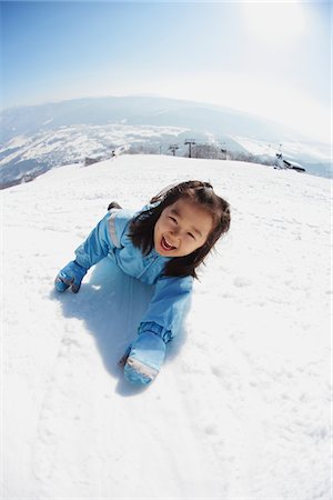 Small Girl Climbing In The Snow Stock Photo - Rights-Managed, Code: 859-03841027