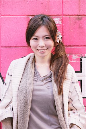 pony tail - Japanese Women Standing In Front Of Pink Wall Stock Photo - Rights-Managed, Code: 859-03860473