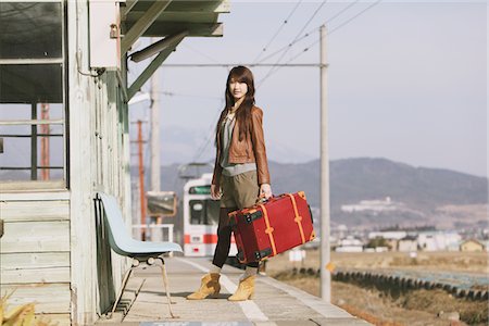 railway japan photography - Young Woman Standing On Platform Stock Photo - Rights-Managed, Code: 859-03860686