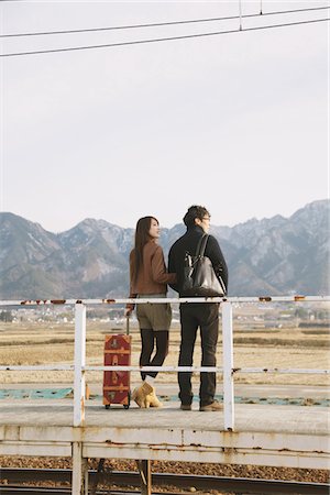 simsearch:841-07083701,k - Young Japanese Couple waiting On Platform Stock Photo - Rights-Managed, Code: 859-03860719