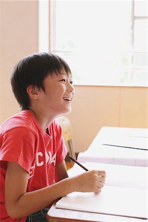 school boys side - Japanese Boy Writing In Notebook Stock Photo - Rights-Managed, Code: 859-03860787