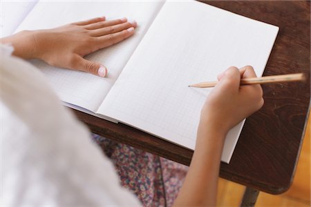 simsearch:6109-06196438,k - Student Writing In Notebook Stock Photo - Rights-Managed, Code: 859-03860795