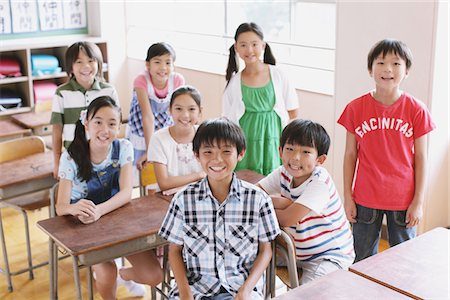 Students Smiling And Posing In Classroom Stock Photo - Rights-Managed, Code: 859-03860809