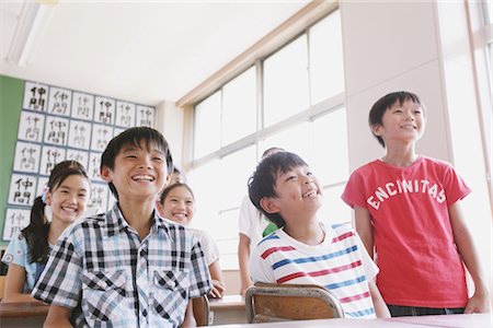 simsearch:6109-06196438,k - Students Smiling In Classroom Stock Photo - Rights-Managed, Code: 859-03860810