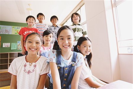 Students Smiling And Posing In Classroom Stock Photo - Rights-Managed, Code: 859-03860813