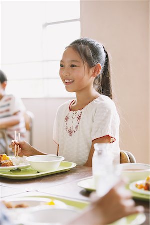 school boys side - Girl Eating Food Stock Photo - Rights-Managed, Code: 859-03860887