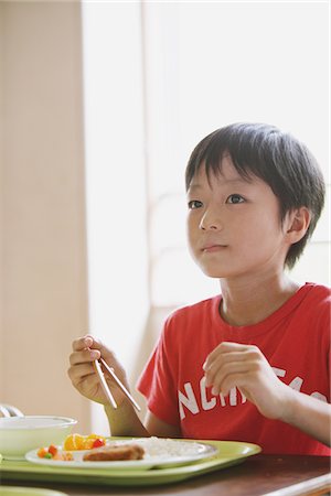 school boys side - Boy Eating Food Stock Photo - Rights-Managed, Code: 859-03860888