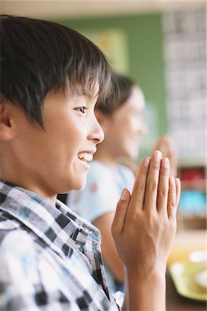 Children Praying Before Meal Stock Photo - Rights-Managed, Code: 859-03860905