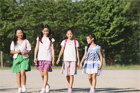 simsearch:859-06380209,k - Schoolchildren Walking Outdoors Stock Photo - Rights-Managed, Code: 859-03860942