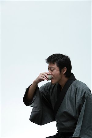 sake - Japanese man drinking Sake Stock Photo - Rights-Managed, Code: 859-03884611