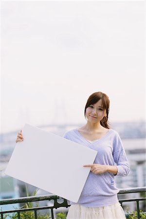 Japanese Women Holding Whiteboard Stock Photo - Rights-Managed, Code: 859-03885290